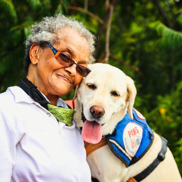 Woman with a Therapy Dog who completed therapy dog Training.
